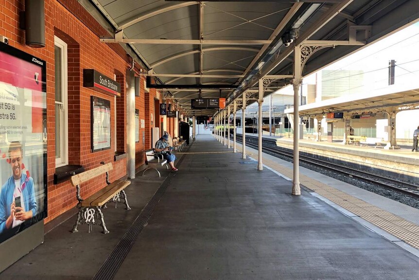 South Brisbane train platform devoid of commuters during peak hour.