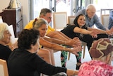 People take part in dance class for the elderly and people with a disability on Queensland's Sunshine Coast