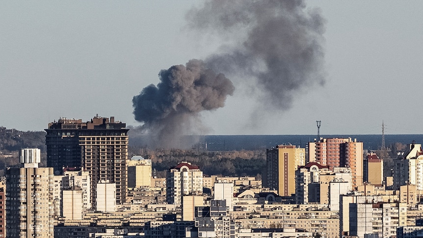 Smoke rises on the outskirts of Kyiv.