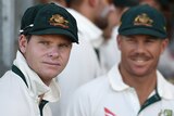 Steve Smith and David Warner look on from the sidelines
