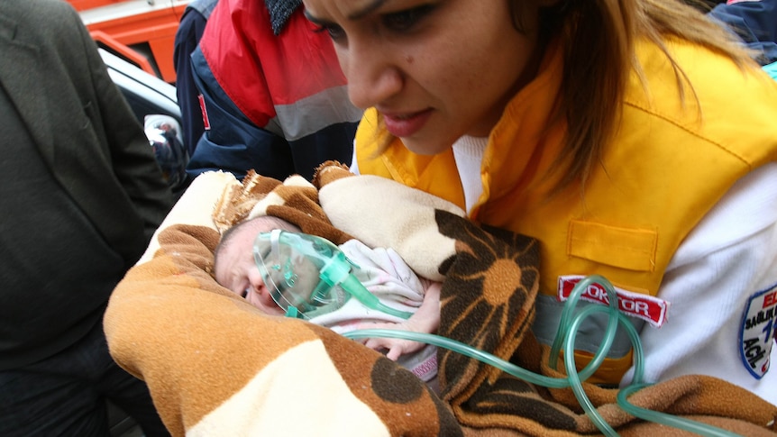Baby pulled from quake rubble