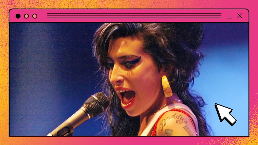 Winehouse is seen singing with her mouth wide open. Her beehive is piled high on her head, and her eyeliner is thick.