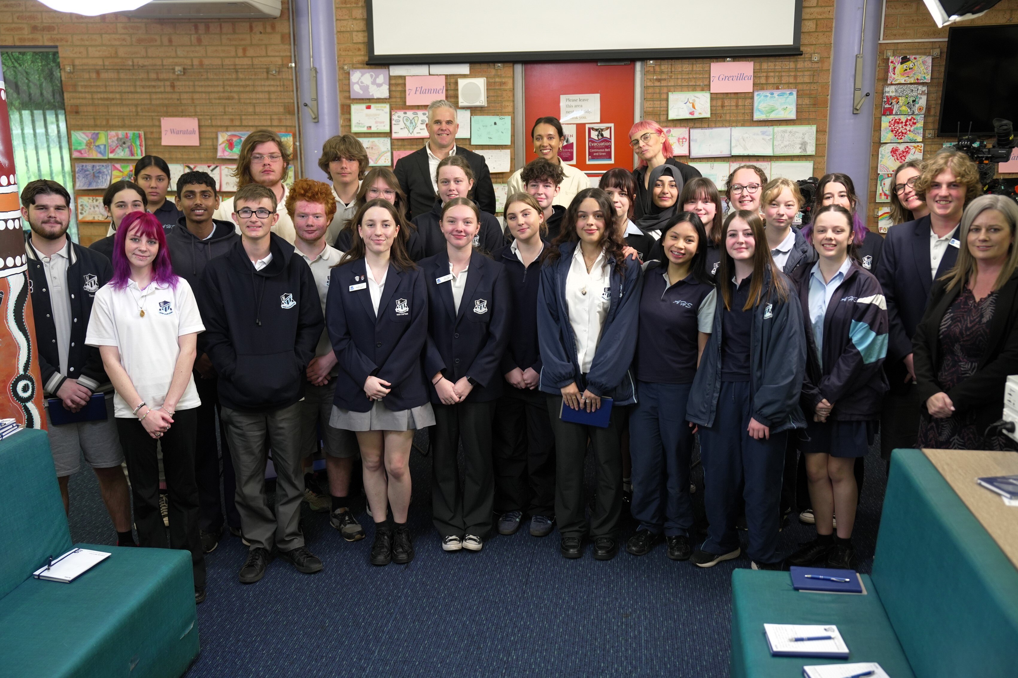 High school students stand in a group