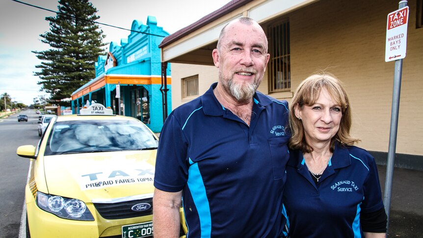 Shane and Susan Burke standing at the two-spot taxi rank in St Arnaud.