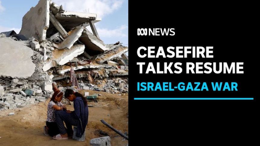 Ceasefire Talks Resume, Israel-Gaza War: A couple huddles together in front of the ruins of a building.