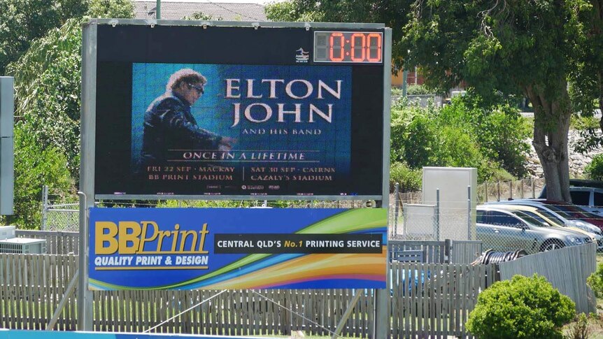 The billboard announcing Elton John's northern Queensland gigs