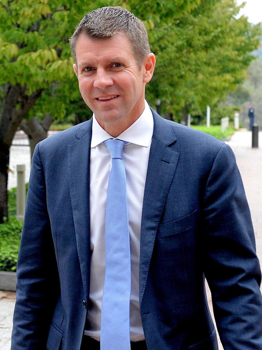 NSW Treasurer Mike Baird arrives for the state and federal treasurers meeting in Canberra.