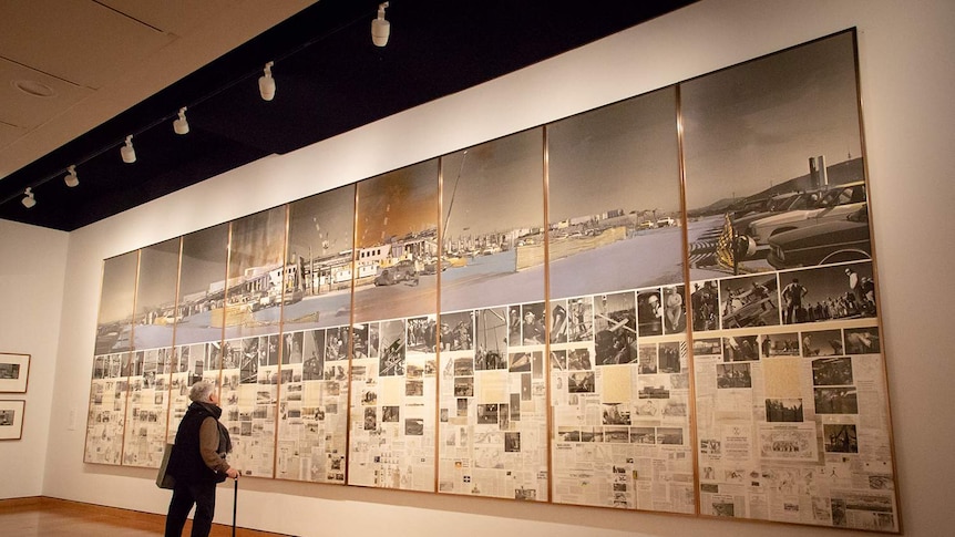 Nine large panels depict the construction of Parliament House.