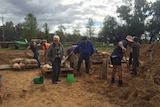 Local residents making sandbags in the isolated area of Bedgerabong.