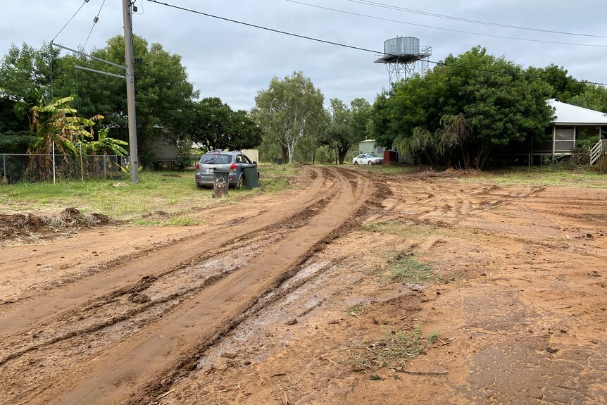 A community with a muddy road track