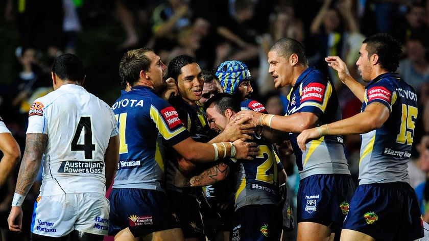 Master class: The Cowboys celebrate another Willie Tonga try.