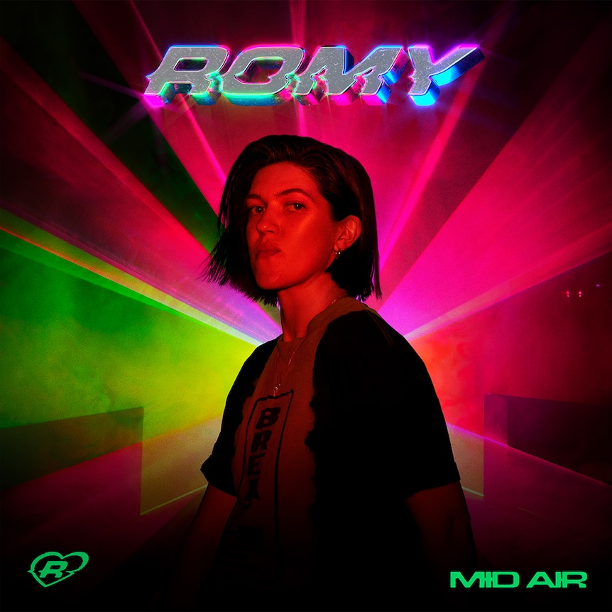 the artwork for Romy's 202 album Mid Air showing the artist illuminated by green and red lasers