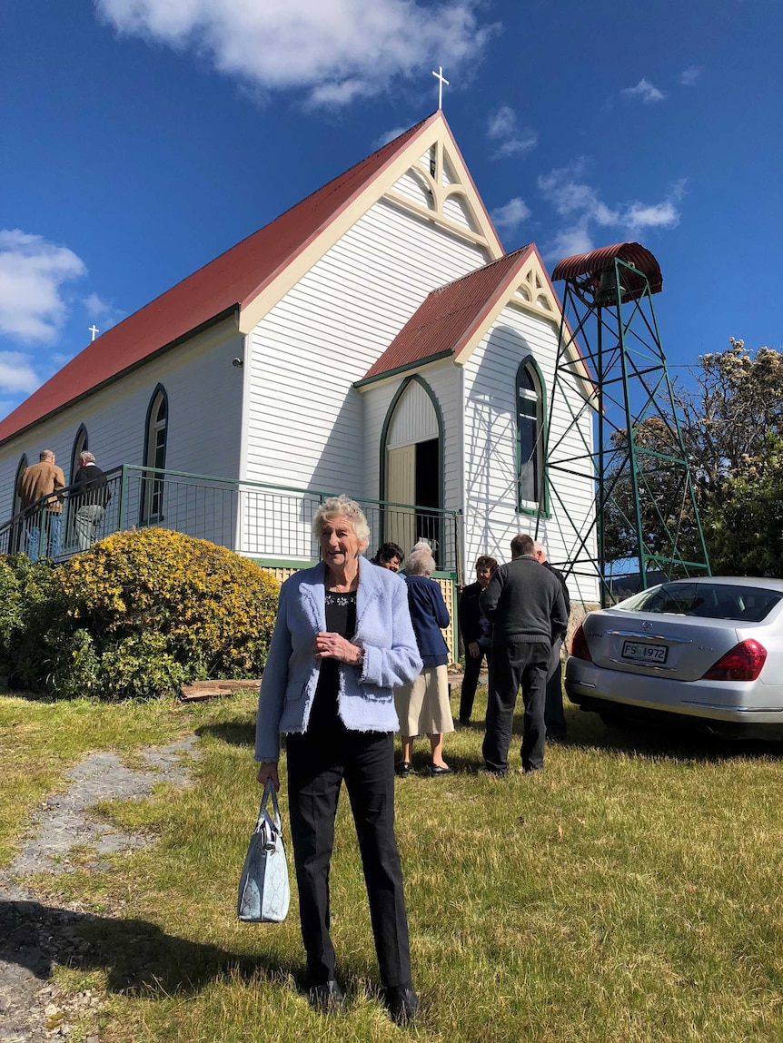 Billie Parry standing outside the Karoola church