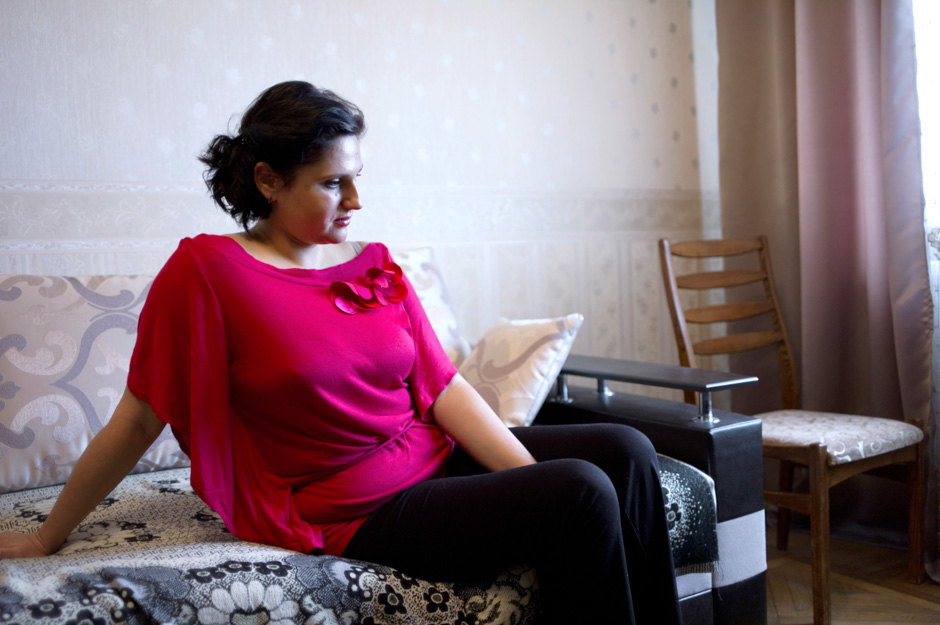 Katja in her Kiev flat, where she now lives with her daughters and her in-laws.