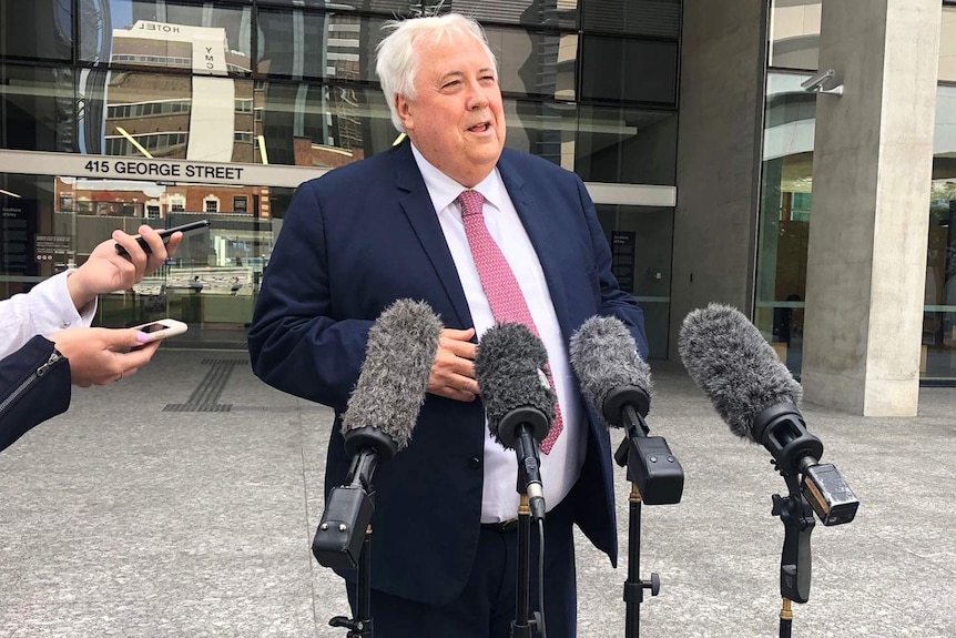 Clive Palmer speaking to media outside court in Brisbane