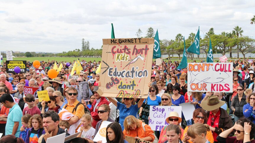 People rally in Langley Park in Perth today protesting cuts to education spending. April 1, 2014.