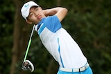 Tianlang Guan tees off on the second hole.