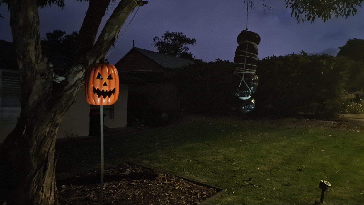 Halloween decorations including hanging body bag draw comparisons with