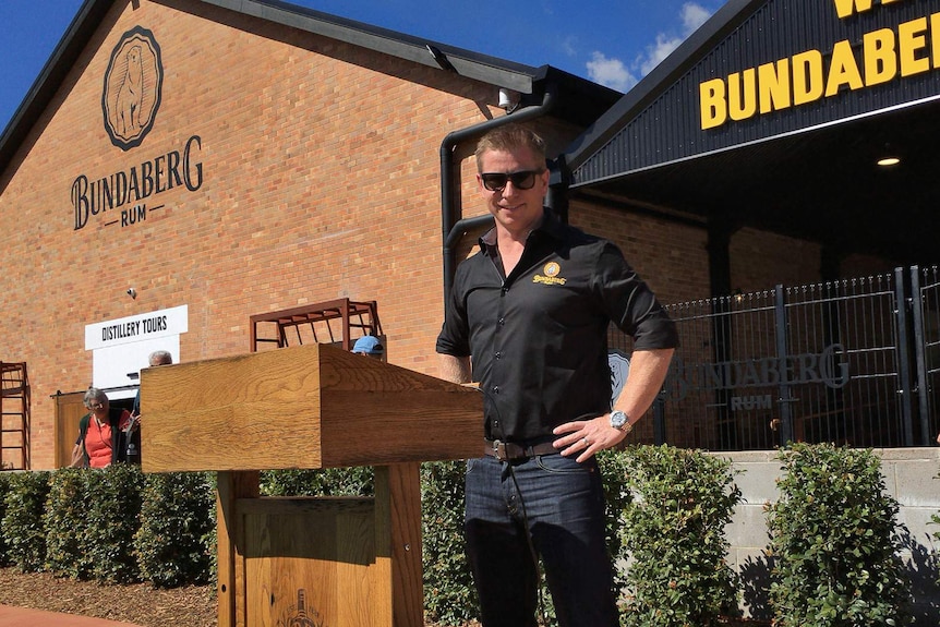 Man standing in front of Bundaberg Rum distillery