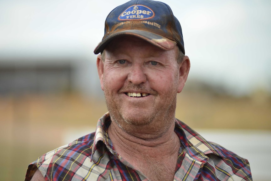 Mr Baty smiling for camera near Broken Hill