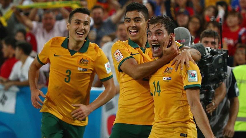 Socceroos celebrate Troisi's goal in Asian Cup final
