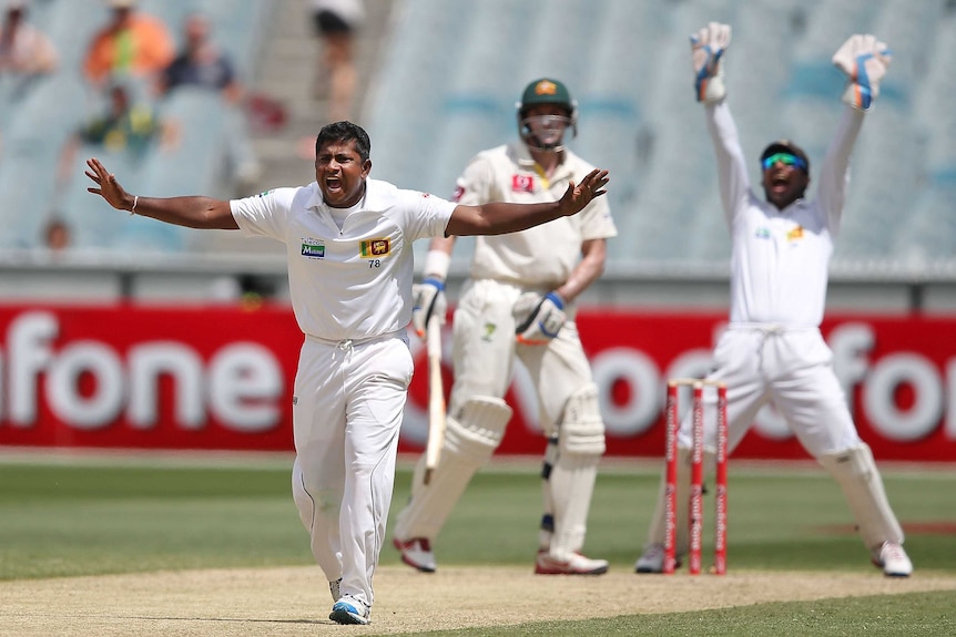 Big shout ... Rangana Herath unsuccessfully appeals for LBW against Michael Hussey.