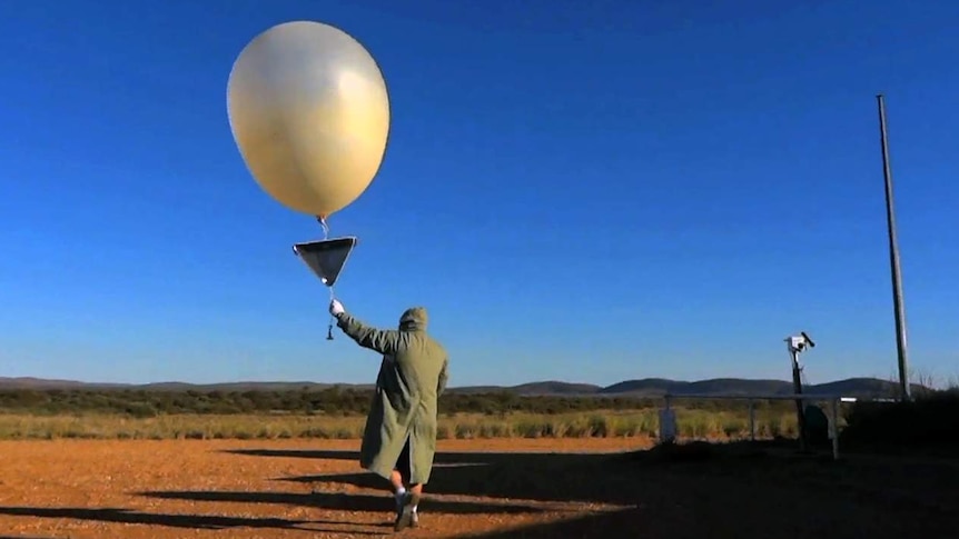 A weather balloon is launched at the Giles Weather Station in Western Australia.