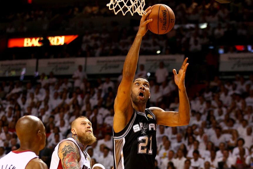 Tim Duncan goes to the basket for San Antonio against Miami in game three of the NBA Finals