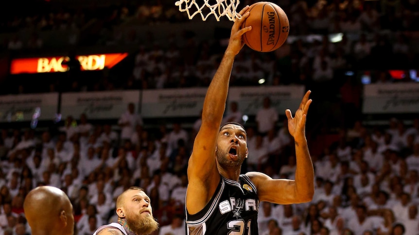 Tim Duncan goes to the basket for San Antonio against Miami in game three of the NBA Finals.