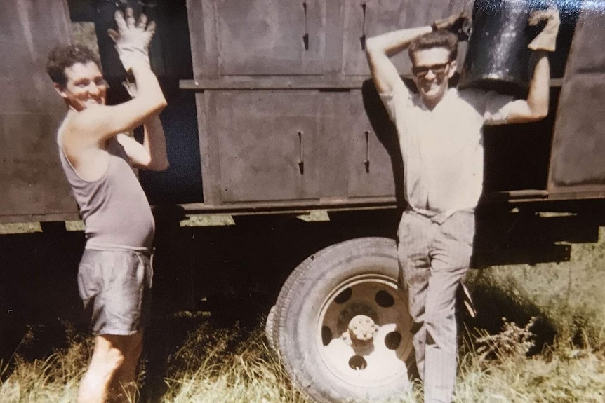 Lyle Barlow (right) as a night soil collector in Brisbane in the 1970s.