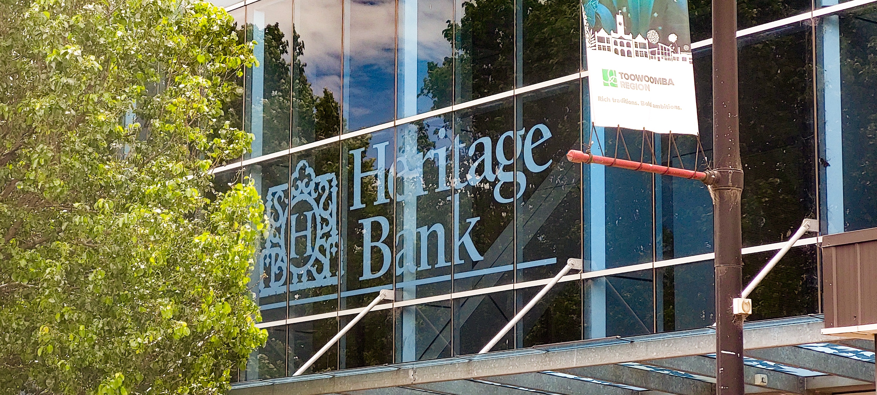 Bank vows headquarters will remain in regional Queensland following merger vote