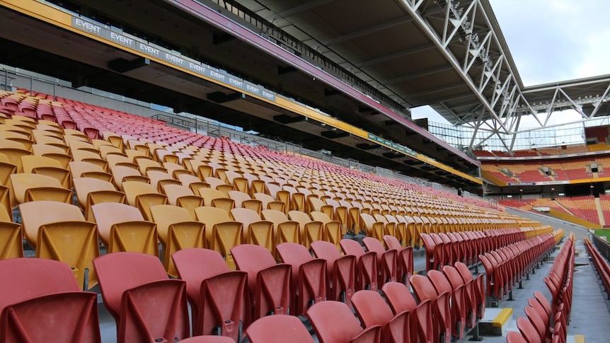 Rows of empty seats in a stadium.