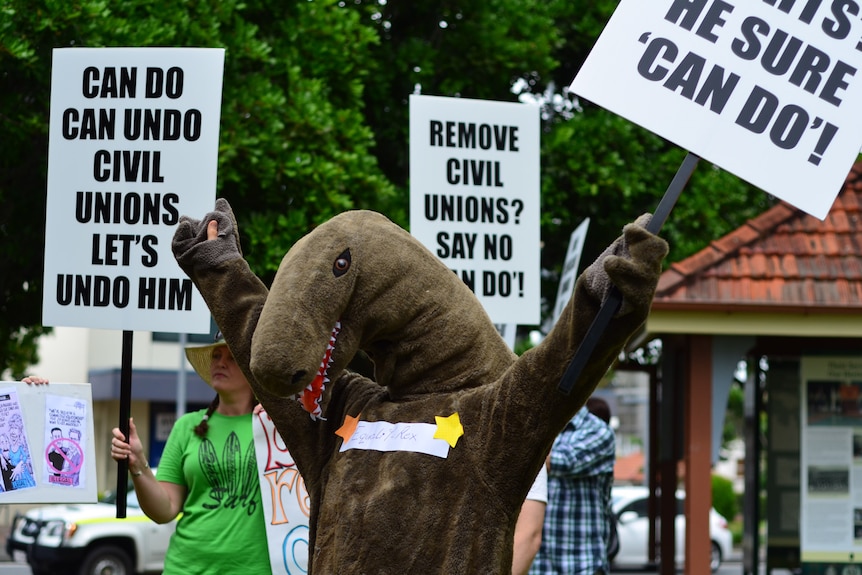 'Equality-Rex' leads a protest against LNP plans to overturn Labor's same-sex civil union legislation