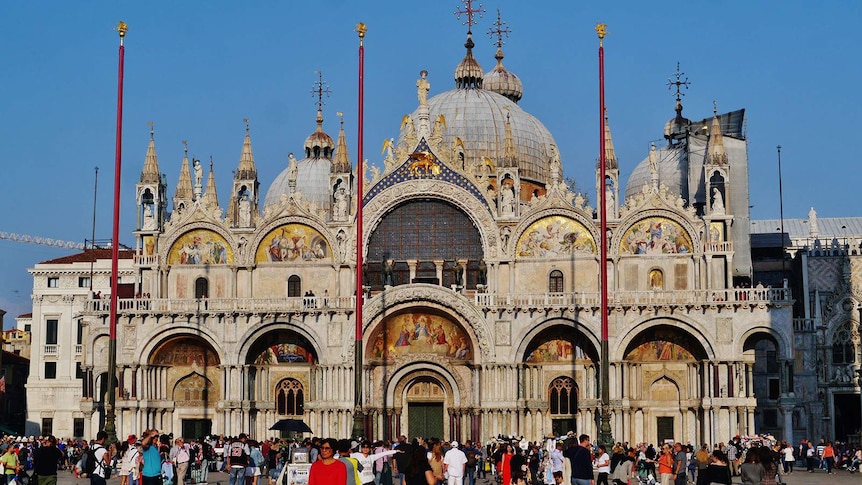 A sunny day in venice with a view of St mark's Basilica