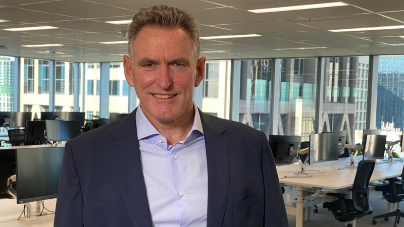 NAB CEO Ross McEwan stands in an empty office.