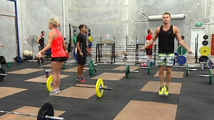 People skipping in a Crossfit gym