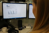 A woman looks at the new National Cancer Control Indicators website
