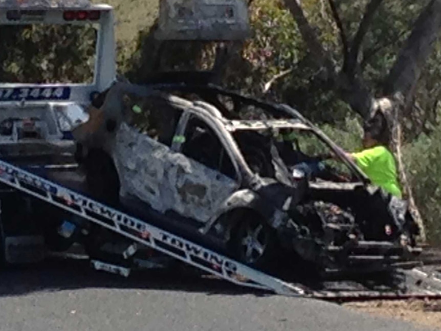 Car being towed after body found in boot at Diggers Rest