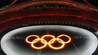 The Olympic rings ablaze during the Athens opening.