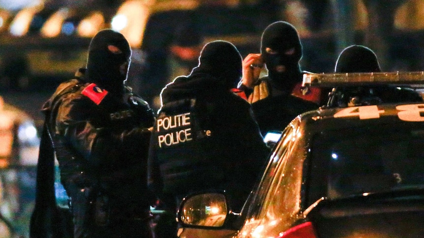 Belgian special police forces take part in an operation in the neighbourhood of Molenbeek, Brussels