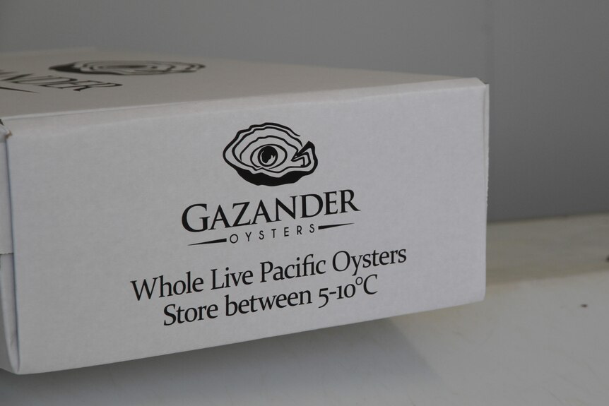 a white box that says in black writing Gazander Oysters "Store between 5-10 C"