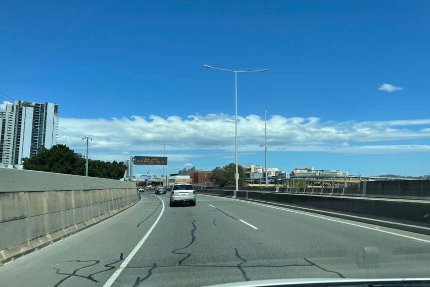 An image of clouds that look like waves breaking in the sky in Brisbane.