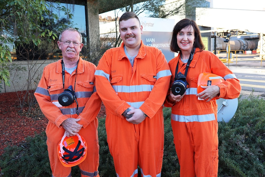 Member for Stuart Geoff Brock stands with Nyrstar Operator Josh Barkla and Deputy Premier Susan Close. 