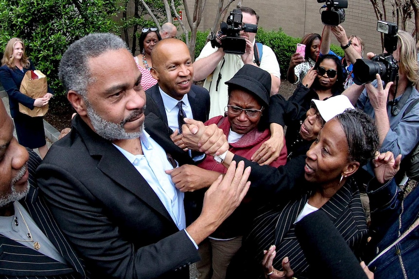 Anthony Ray Hinton is greeted by emotional family