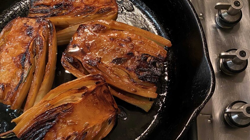 Braised fennel in a cast iron pan