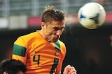 Aerial dominance ... Australia's Dino Djulbic contests the ball in the air against Taiwan.
