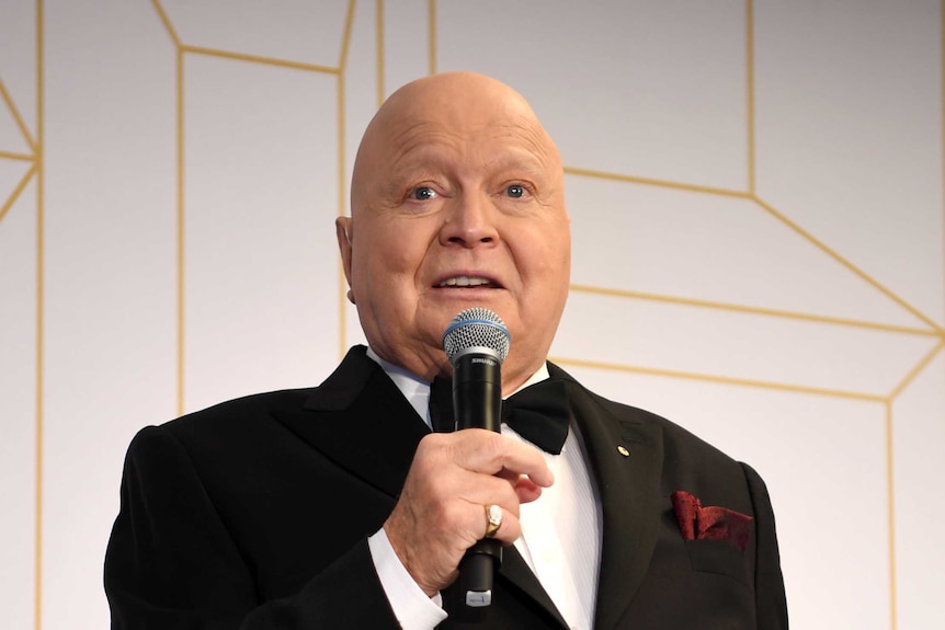 Bert Newton with microphone