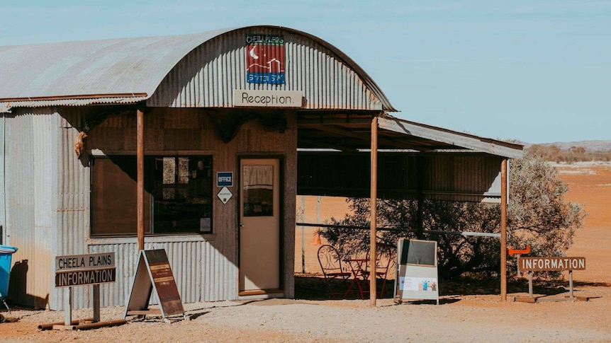 A corrugated-iron building.