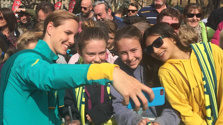 Bronte Campbell takes a selfie with fans in Hobart