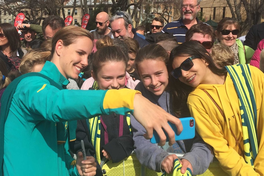 Bronte Campbell takes a selfie with fans in Hobart